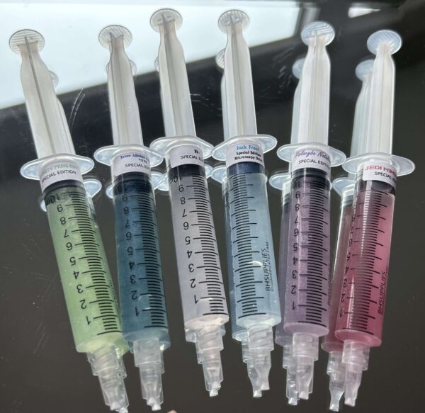 Mushroom spore syringes with liquid culture